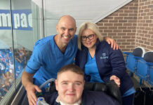 Kelsey is pictured with Dylan and ICU Senior Staff Nurse, George Doonan at the match.