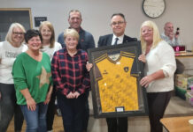 The framed football shirt helped raise much need fund for the community garden