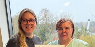 Marianne White with award